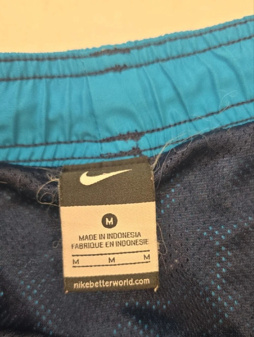 Nike Men’s Dark Blue Swim Trunks with Teal Trim